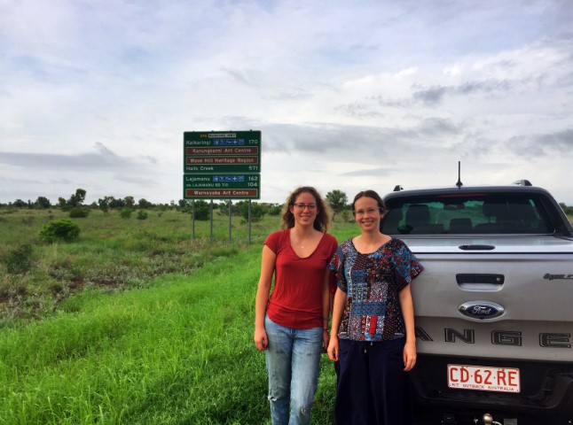 Annabelle and Emma, the 2020 Bower Student Mentors, at the road sign on the Buntine Highway approaching Kalkaringi, NT